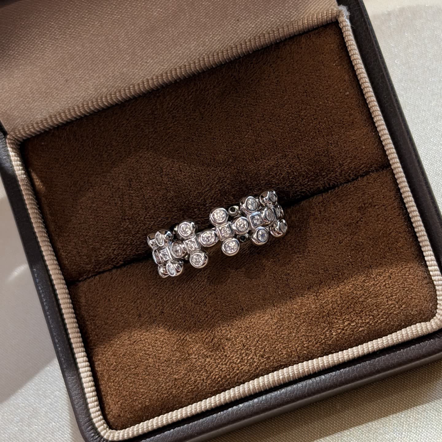 Van Cleef & Arpels Elegant Silver Ring with Cubic Zirconia Stones